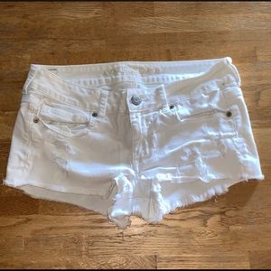 White ripped American Eagle shorts